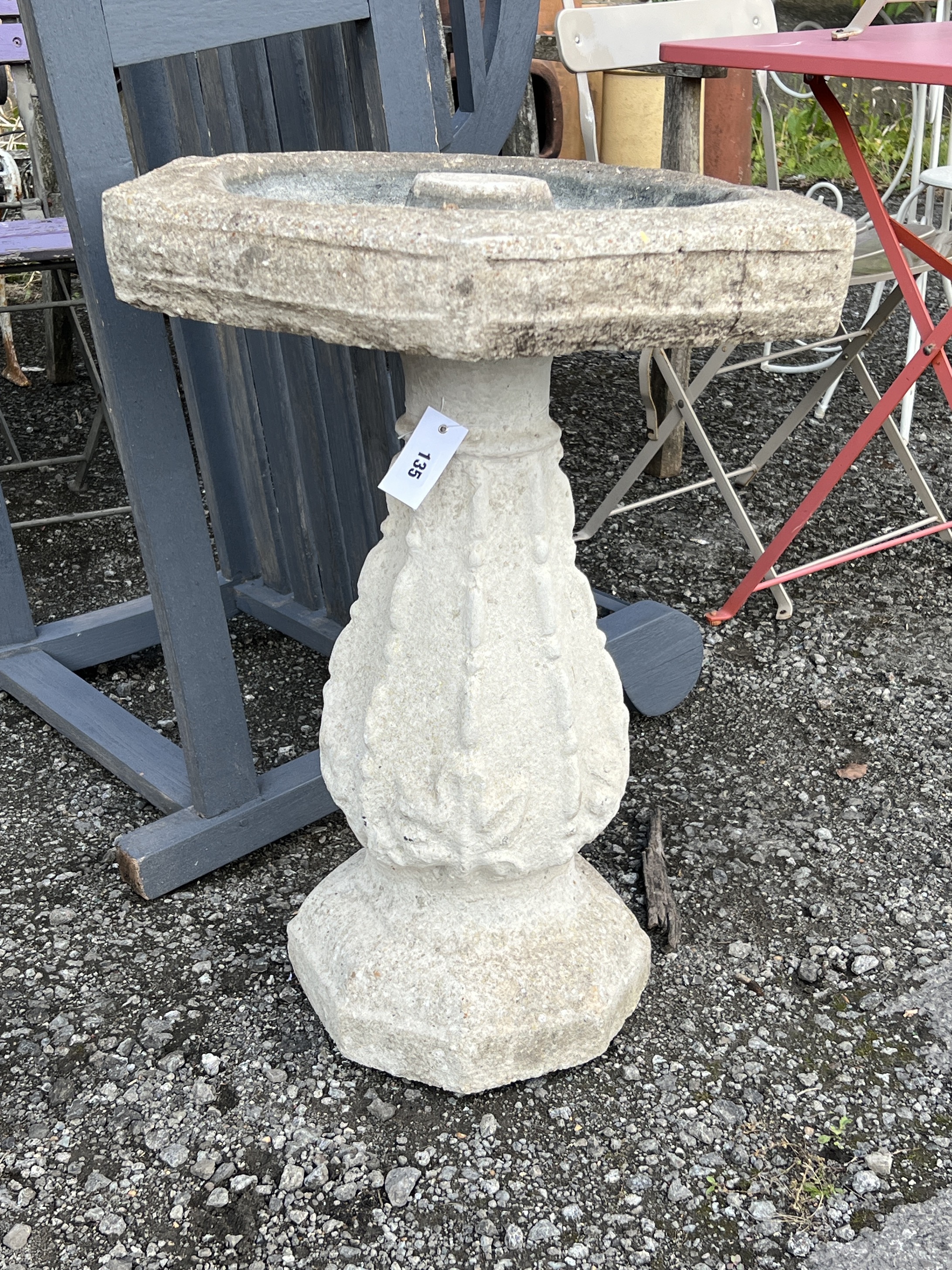 A reconstituted stone hexagonal bird bath, width 56cm, height 68cm